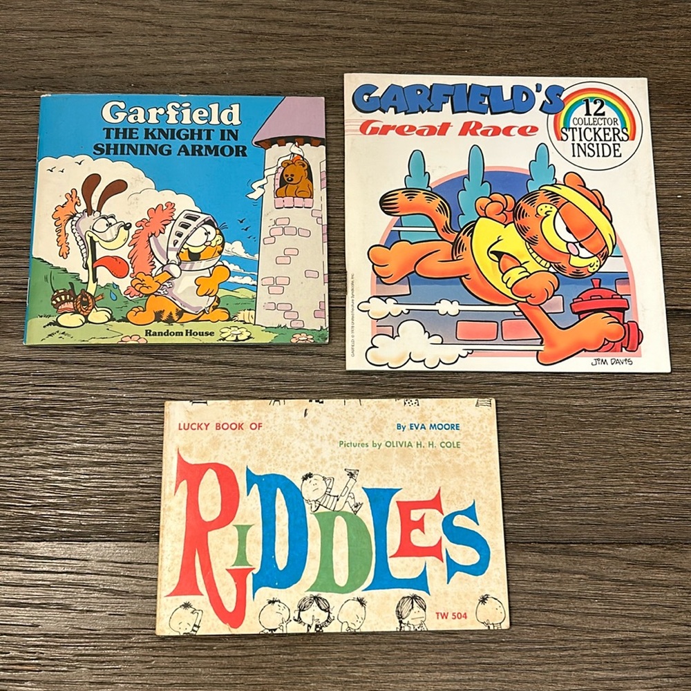 Vintage two Garfield children’s books one with original stickers plus riddles
